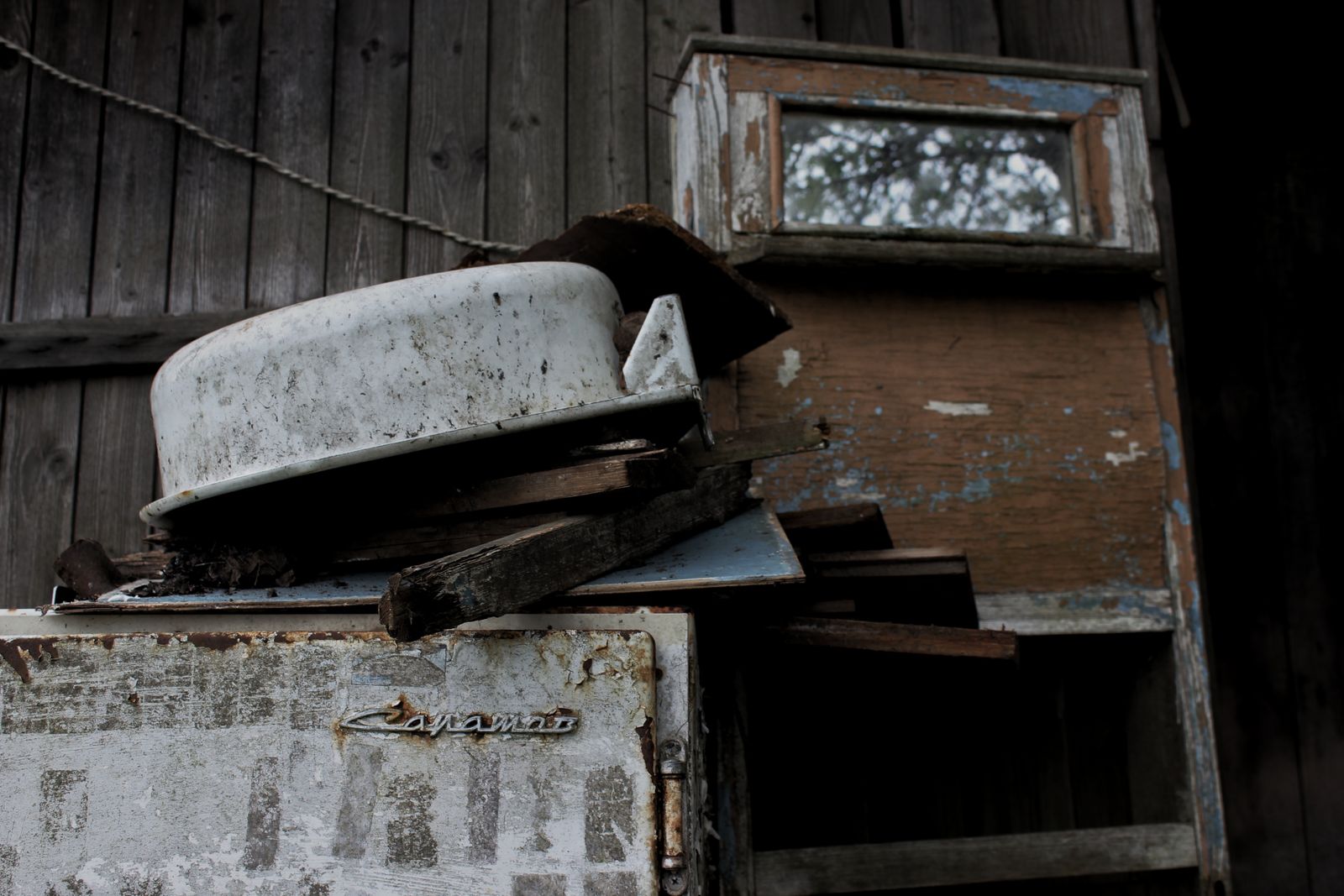 Old rusted appliances set out for pickup and recycling in Elk Grove, CA