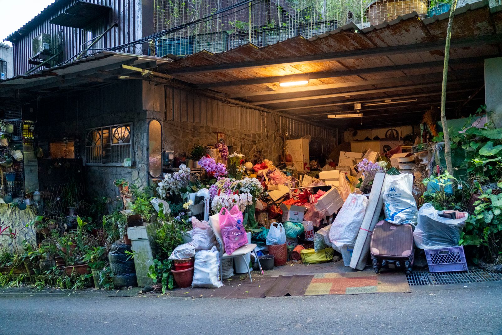 Cluttered garage packed with household items before a full cleanout in Elk Grove, CA